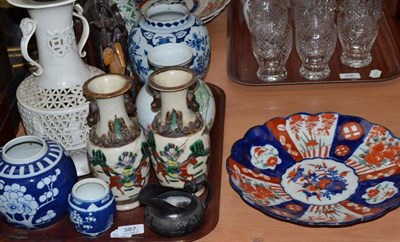 Lot 387 - Tray including Japanese Imari plate, Delft blue and white vase, Chinese table lamp, soap stone...