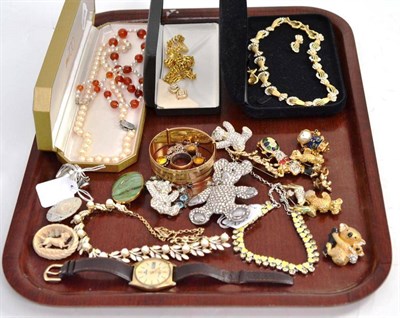 Lot 402 - A quantity of silver and costume jewellery including amber set brooches by Butler & Wilson, etc