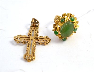 Lot 405 - A jade type dress ring stamped '14K' and a cross pendant