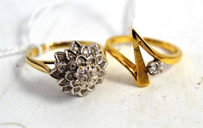 Lot 409 - A 9ct gold diamond cluster and 18ct gold solitaire ring