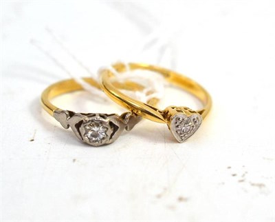 Lot 415 - An 18ct gold heart shaped solitaire ring and an 18ct gold solitaire ring