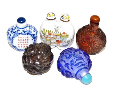 Lot 427 - Four Chinese snuff bottles and ball carving