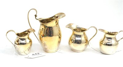 Lot 442 - Four small silver jugs