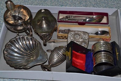 Lot 456 - A quantity of assorted silver to include shell butter dish, sugar tongs, napkin rings,...