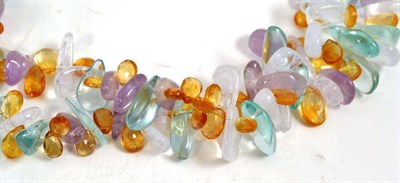 Lot 476 - A multi gemstone necklace, polished and faceted fluorite, rock crystal, amethyst and citrine strung