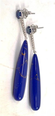 Lot 480 - A pair of sapphire, diamond and lapis lazuli type drop earrings, an oval cut sapphire suspends...