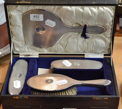 Lot 482 - A brush and mirror set, cased