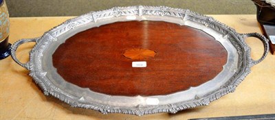 Lot 486 - An Edwardian twin handled inlaid mahogany and plated tray