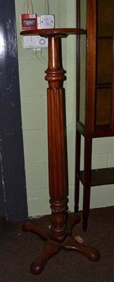 Lot 562 - A 19th century mahogany torchere