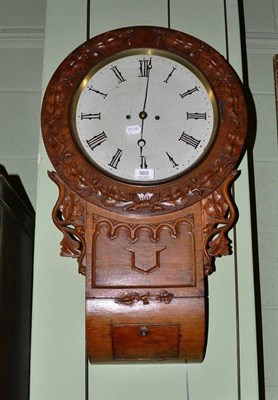 Lot 565 - Carved oak drop dial wall clock