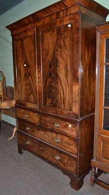 Lot 567 - Georgian mahogany linen press