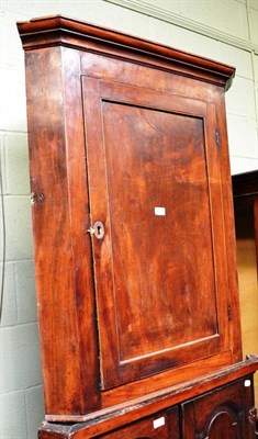 Lot 572 - Mahogany corner cupboard