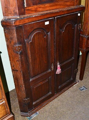 Lot 573 - Oak corner cupboard with panelled doors