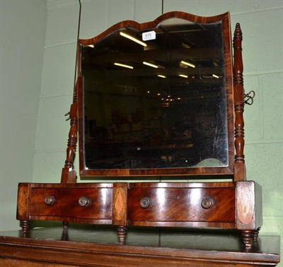 Lot 575 - A 19th century mahogany toilet mirror with two drawers