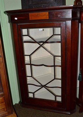 Lot 578 - A mahogany hanging corner cupboard