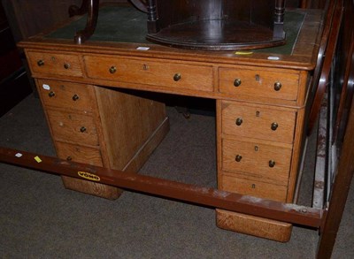 Lot 586 - A Victorian oak desk of small proportions