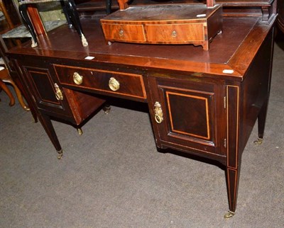 Lot 600 - An Edwardian cross- banded mahogany writing table