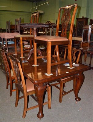 Lot 610 - Mahogany wind-out dining table and six chairs