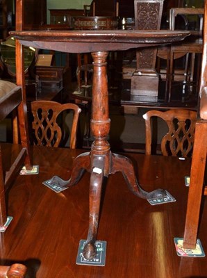 Lot 611 - A Georgian mahogany tripod table