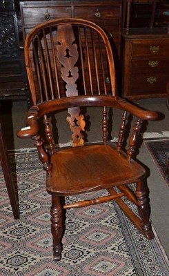 Lot 617 - Yew and elm Windsor rocking chair