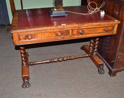 Lot 621 - Victorian walnut writing table fitted with two drawers