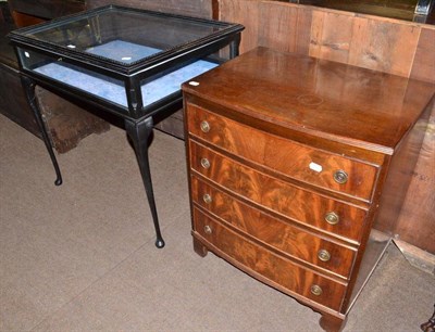 Lot 622 - An ebonised bijouterie cabinet and a mahogany chest