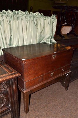 Lot 624 - An 18th century oak coffer on stand