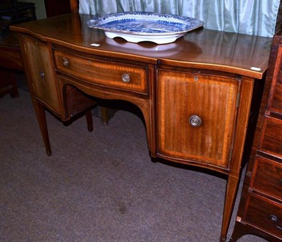 Lot 633 - A 19th century cross-banded mahogany breakfront sideboard