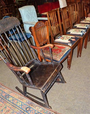 Lot 645 - Painted mahogany rocking chair, oak occasional chair and a set of four mahogany dining chairs