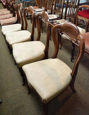 Lot 647 - A set of four Victorian mahogany balloon back dining chairs and a set of four mahogany and...