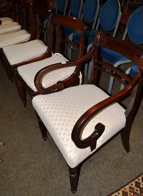 Lot 654 - Four rosewood bar-back dining chairs and two mahogany carvers upholstered to match