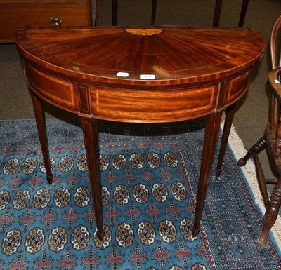 Lot 659 - A 19th century mahogany inlaid D-shaped table (was card/games table, has been nailed down)