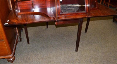 Lot 667 - Late 19th century mahogany drop leaf dining table