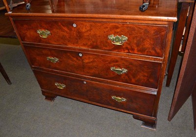 Lot 671 - An early 19th century mahogany three drawer chest