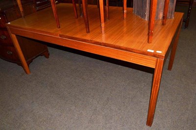 Lot 674 - A 1960's/70's teak extending dining table