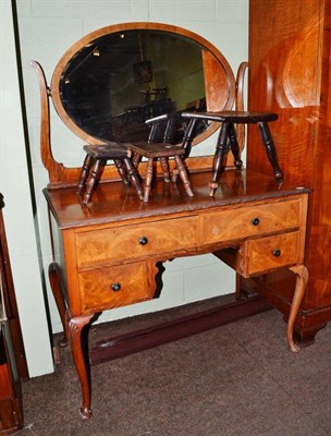 Lot 691 - A 1930's five piece figured walnut bedroom suite comprising wardrobe, two beds, chest of...