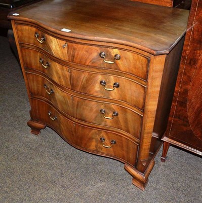 Lot 700 - Mahogany serpentine front chest of drawers