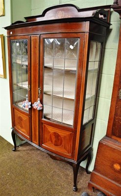 Lot 714 - An Edwardian inlaid mahogany display cabinet