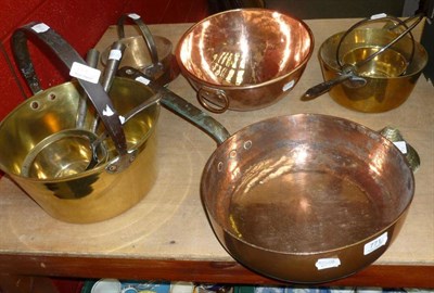 Lot 771 - Copper and brass ware including jam pans, etc