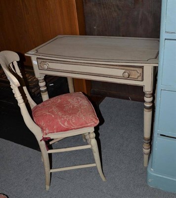 Lot 828 - A painted table and matching chair