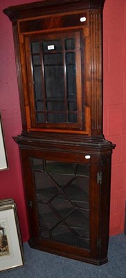 Lot 851 - An oak glazed hanging cupboard and a mahogany corner cupboard