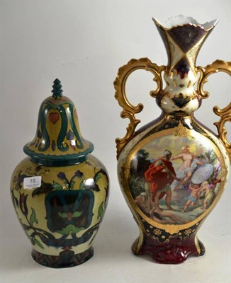Lot 19 - A Vienna twin-handled vase and a Cairo ware vase