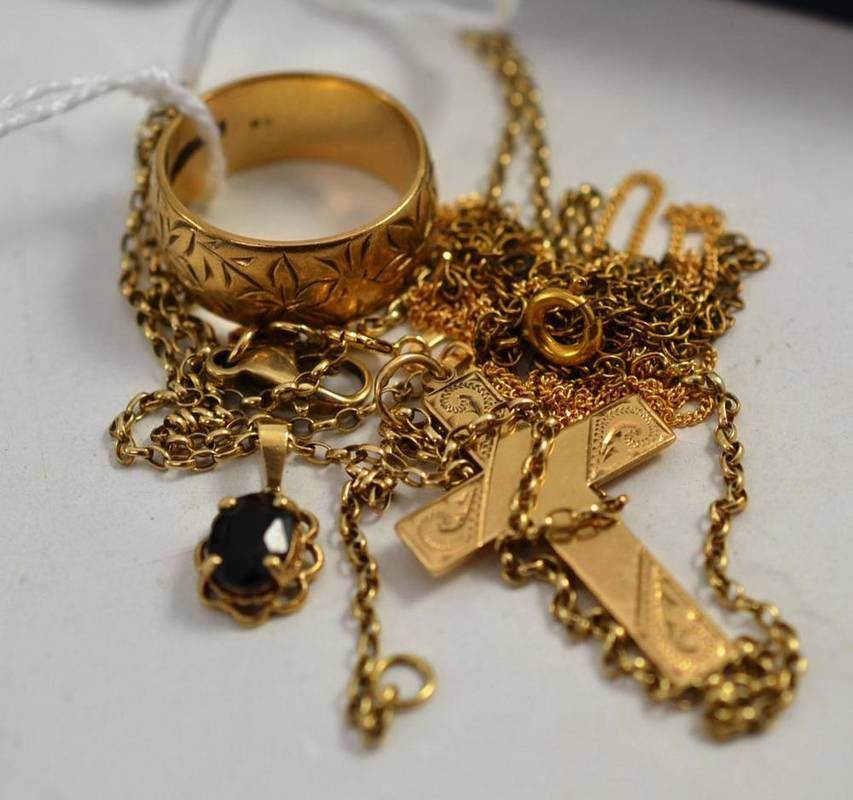 Lot 124 - A 9ct gold cross on chain, a 9ct gold chain, a chain and pendant and a 9ct gold band ring