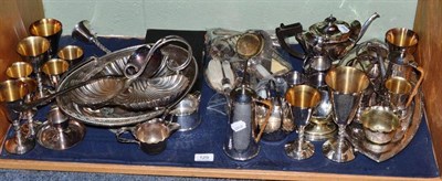 Lot 129 - Three piece plate tea set and tray and a quantity of electroplate