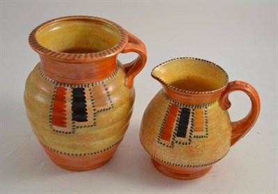 Lot 142 - A Crown Ducal orange glazed vase and jug