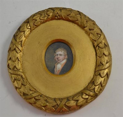 Lot 152 - Miniature portrait of a regency gentleman in a plaster gilt frame with foliage decoration