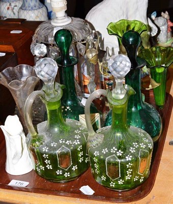 Lot 176 - A tray of decorative glass including Mary Gregory style claret jugs and decanters, a table...