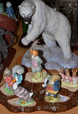 Lot 177 - Five Beswick Beatrix Potter figures and a display stand and a Franklin Mint polar bear