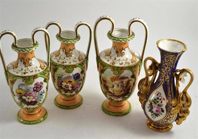 Lot 201 - A 19th century English garniture of three porcelain vases painted with flowers and a...