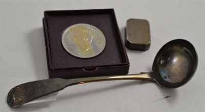 Lot 221 - A small silver pill box, a Scottish silver toddy ladle and a boxed Festival of Britain crown